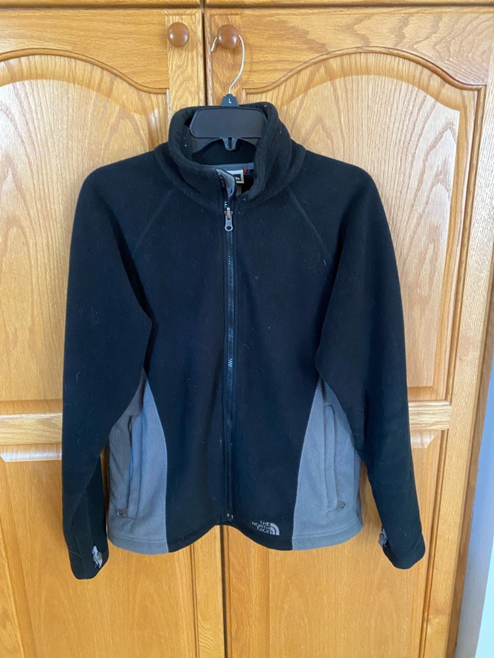 The North Face Black with Gray Side-Panel Fleece Jacket. Size medium.
